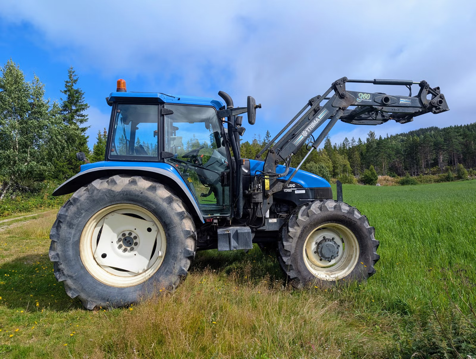 New Holland TS115, Anul 2002 - imagine 2